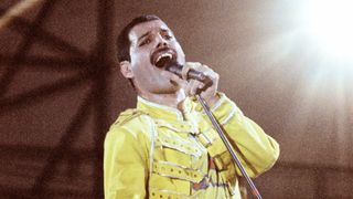 Freddie Mercury performing live on stage