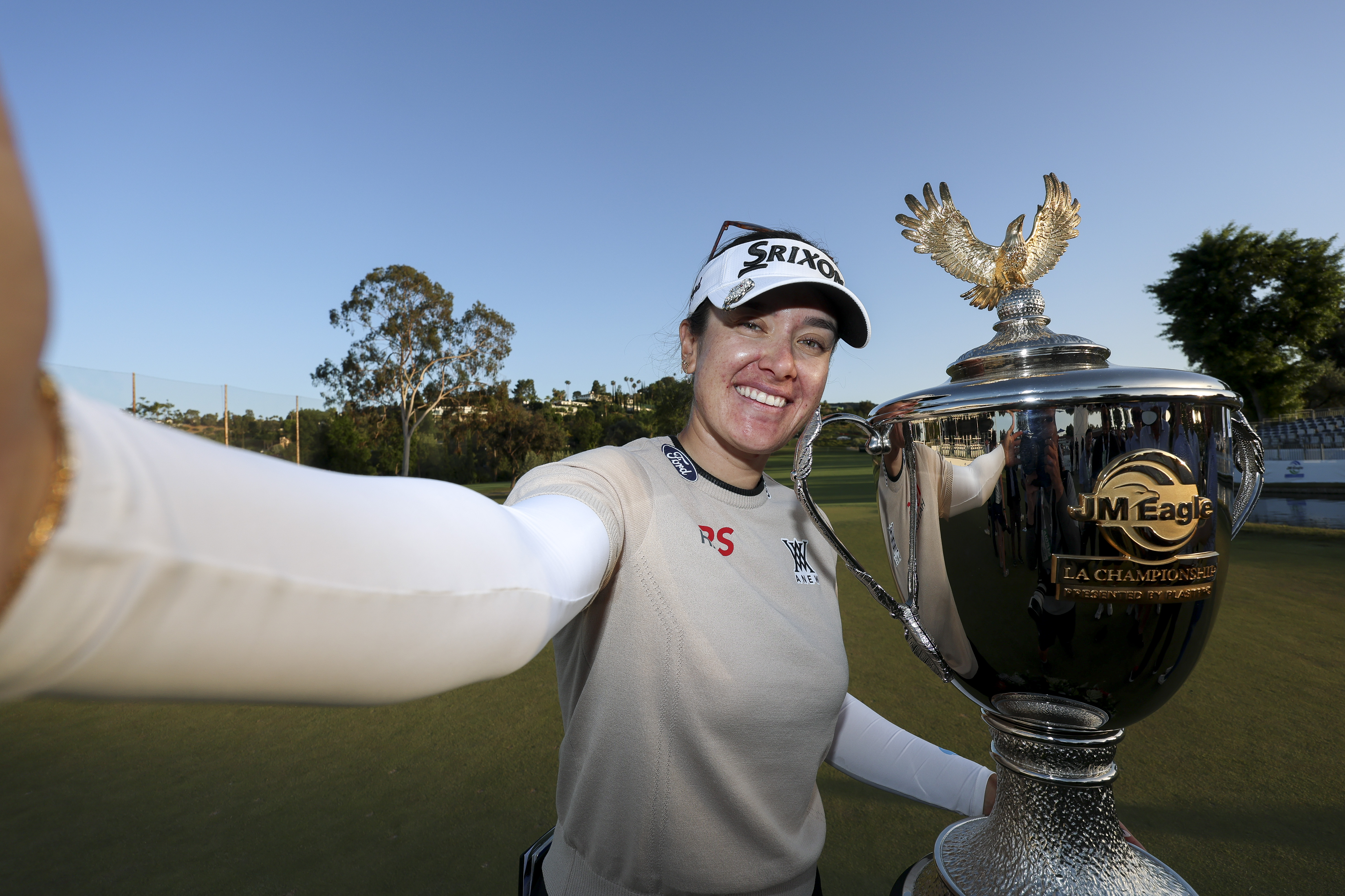 Hannah Green takes a selfie with the JM Eagle LA Championship after her win in 2026