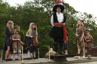 Swallows and Amazons Rafe Spall Captain Flint walks the plank