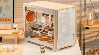 The Colorfire Colorful Meow ME26A PC case seen on a white desk.