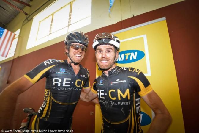 Erik Kleinhans (left) congratulates Team RE:CM teammate, Waylon Woolcock, on his victory at the MTN Ride Crater Cruise
