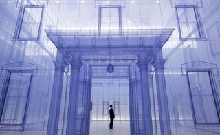 Image of a life-size house with a person stood in the doorway made from translucent fabric in blue