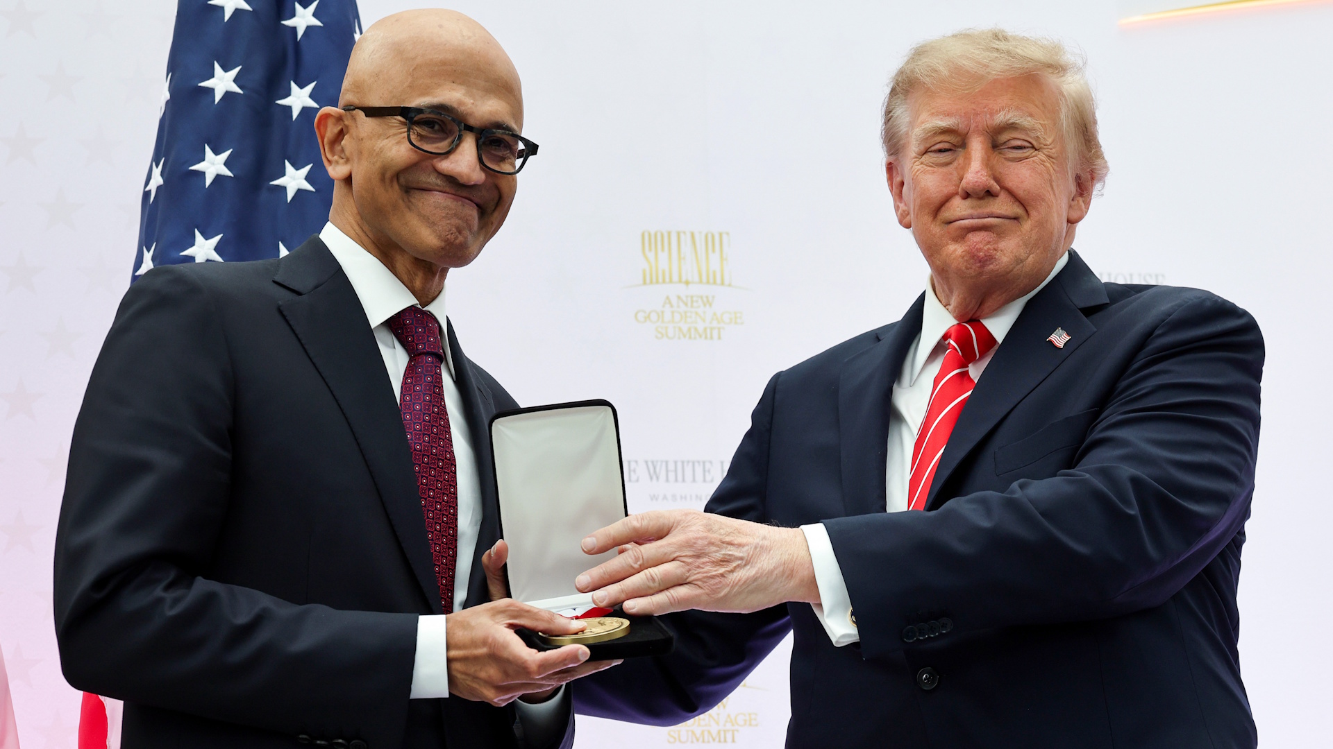 WASHINGTON, DC - OCTOBER 08: CEO of Microsoft Satya Nadella (L) receives the National Medal of Technology and Innovation from U.S. President Donald Trump during the Golden Age of American Innovation Summit at the Institute of Peace on October 08, 2026 in Washington, DC. Trump awarded some of the nation's highest scientific honors to technology leaders including Elon Musk, Sergey Brin, Jensen Huang, Lisa Su, Michael Dell, and Satya Nadella. (Photo by Win McNamee/Getty Images)