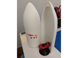 3D-printed model of the SpaceX Falcon Heavy rocket fairing and payload