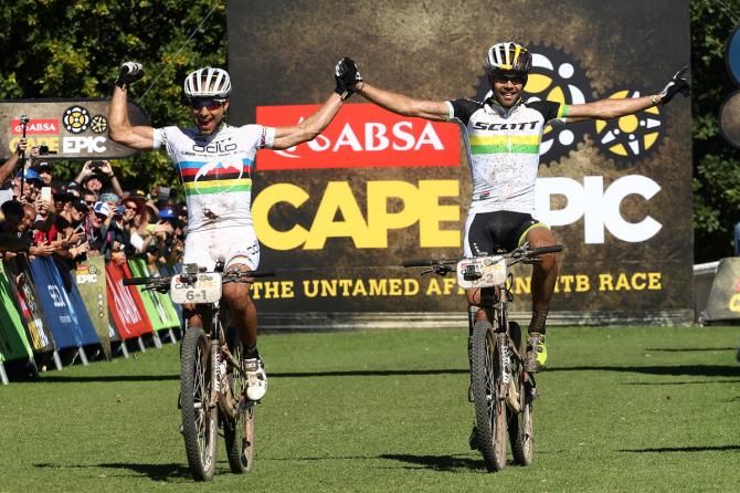 Nino Schurter and Philip Buys of SCOTT-Odlo MTB Racing celebrate as they win stage 6