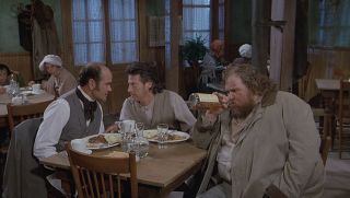 John Candy in Wagon's East