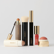 MERIT Beauty products in a line, on white background