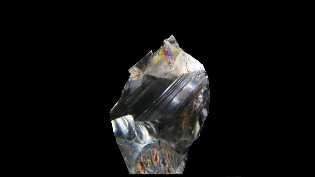 Fragment of transparent quartz crystal found at Neolithic burial site.