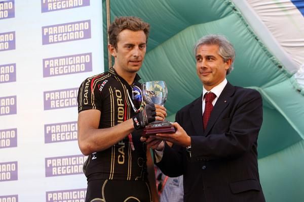 Third place finisher Daniele Colli (Carmiooro - A Style) on the podium.