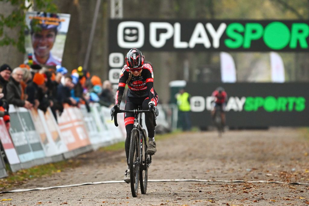 RIJKEVORSEL BELGIUM NOVEMBER 19 Denise Betsema of The Netherlands and Team Pauwel Sauzen Bingoal crosses the finish line on second place during the 36th Superprestige Merksplas 2022 Womens Elite Superprestige2023 CXWorldCup CycloCross on November 19 2022 in Rijkevorsel Belgium Photo by Luc ClaessenGetty Images