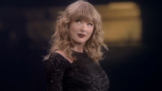 Taylor Swift smiling during Reptuation Stadium Tour concert film