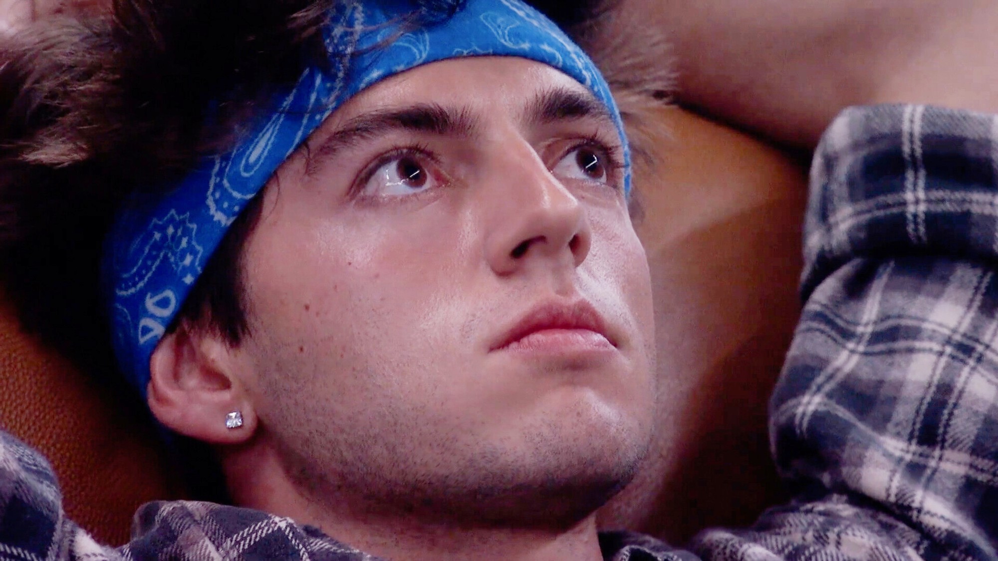 Drew Campbell making a sad face as he was reflecting on a vote in the Big Brother house