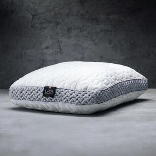 Luxome LAYR Pillow against a gray background.