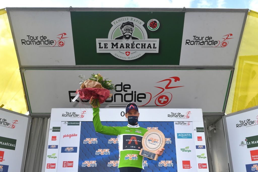 ORON SWITZERLAND APRIL 27 Rohan Dennis of Australia and Team INEOS Grenadiers Green Points Jersey celebrates at podium during the 74th Tour De Romandie 2021 Prologue a 405km Individual Time Trial stage from Oron to Oron 700m Trophy Mask Covid Safety Measures ITT TDR2021 TDRnonstop UCIworldtour on April 27 2021 in Oron Switzerland Photo by Luc ClaessenGetty Images