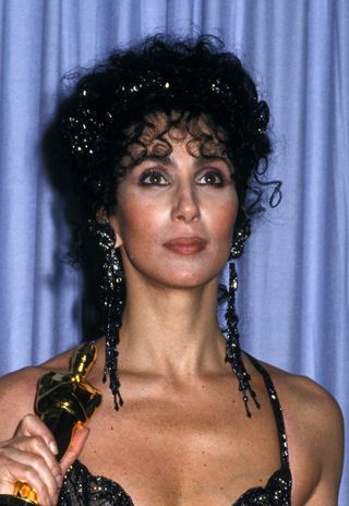 Cher attends the 60th Annual Academy Awards on April 11, 1988 at Shrine Auditorium in Los Angeles, California