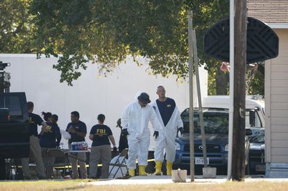 Police investigate a shooting at the the First Baptist Church of Sutherland Springs, Texas