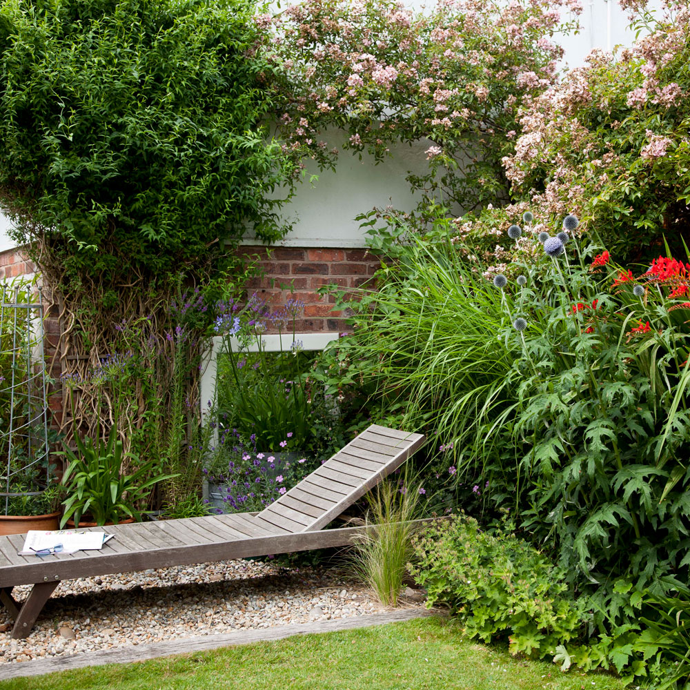 cottage garden with lounger chair