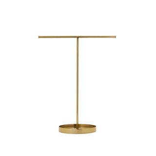 A gold jewelry stand