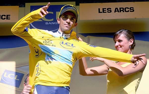 Alberto Contador (Astana) in yellow on the podium.