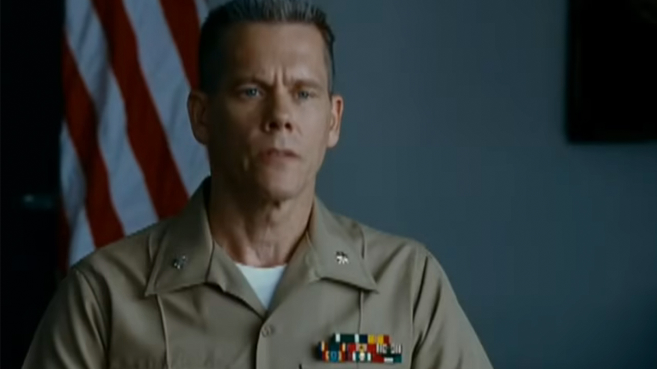 Kevin Bacon in a tan Marine uniform in Taking Chance