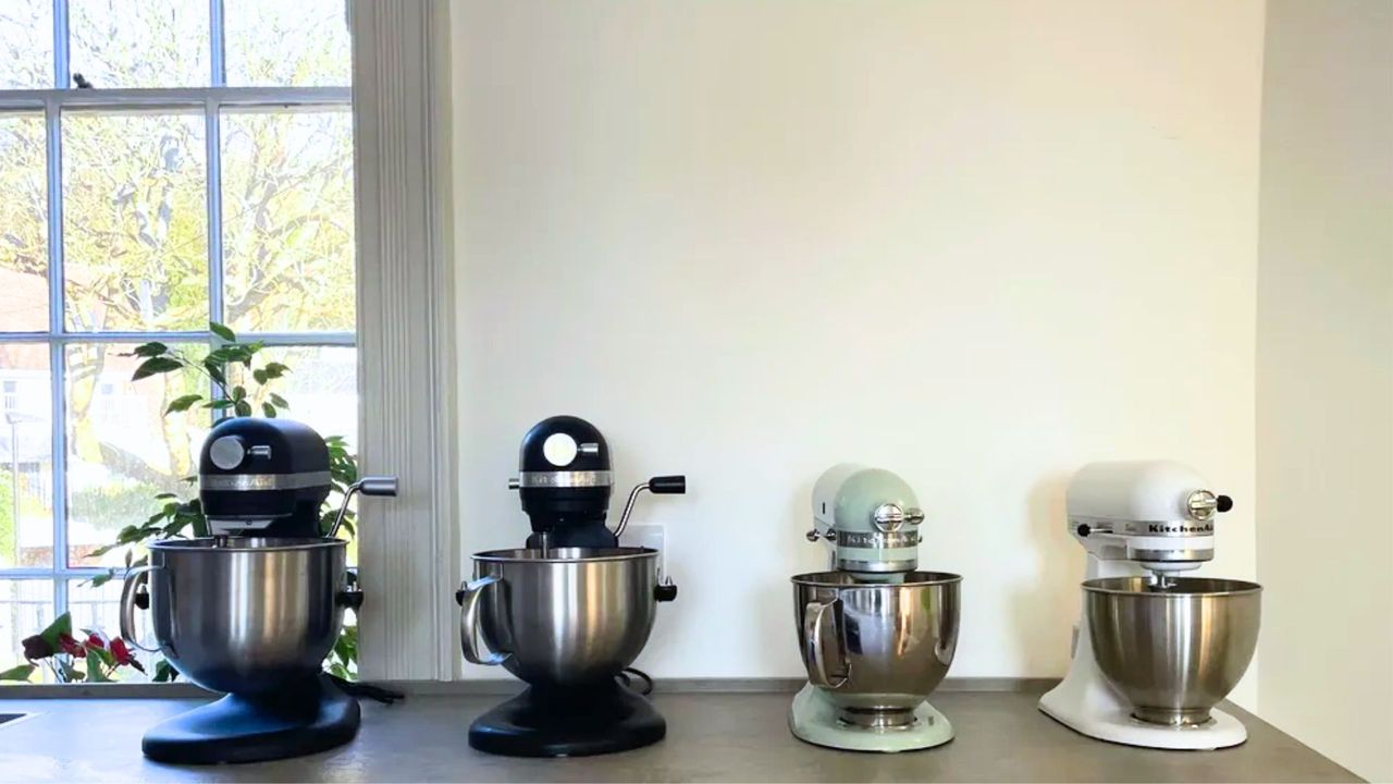 The best stand mixers - KitchenAid 6.6-litre Artisan Bowl Lift Stand Mixer on the counter next to the 5.6 stand mixer, the classic, and the artisan