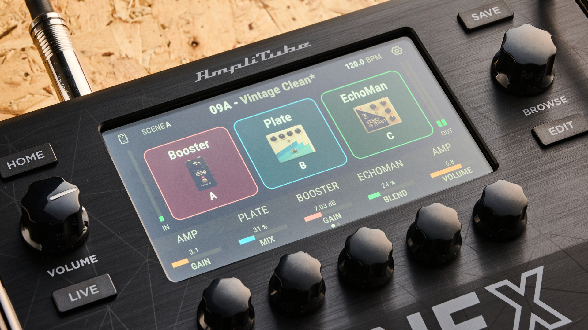 IK Multimedia Tonex Board shot on OSB wood surface.