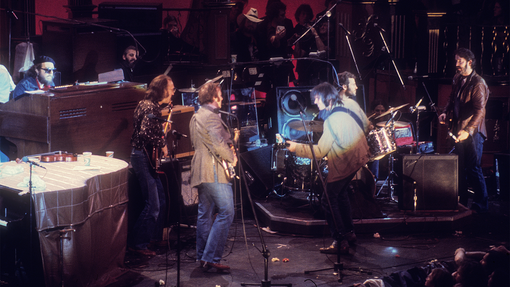 The Band and friends (L to R: Dr. John, Ringo Starr, Carl Radle, Stephen Stills, Neil Young, Levon Helm, Paul Butterfield) perform during The Last Waltz at Winterland on November 25, 1976 in San Francisco, California.