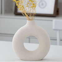 8. RyddeligHome Store White Donut Vase: £20 at Amazon