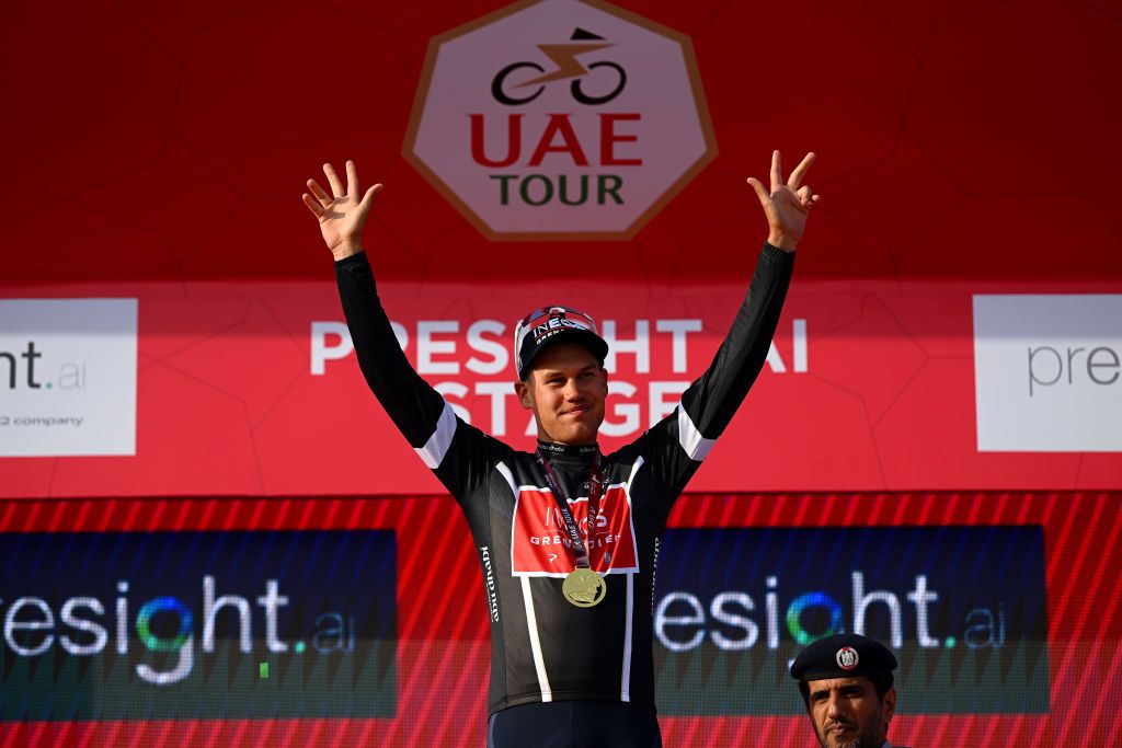 Luke Plapp (Ineos Grenadiers) celebrates on the podium after winning the black sprinter&#039;s jersey on stage 1 of the 2023 UAE Tour