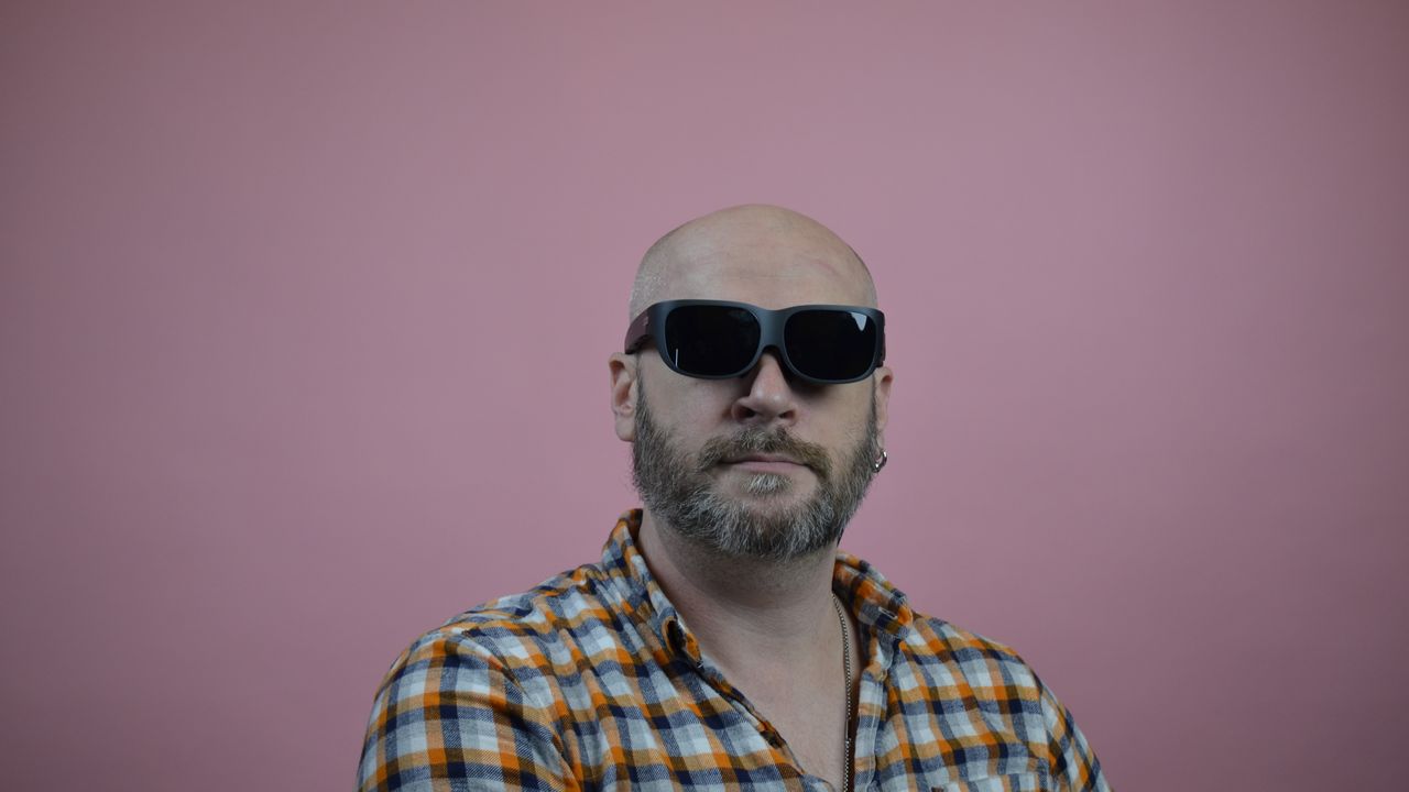 Editor John Loeffler wearing Lenovo Legion Glasses