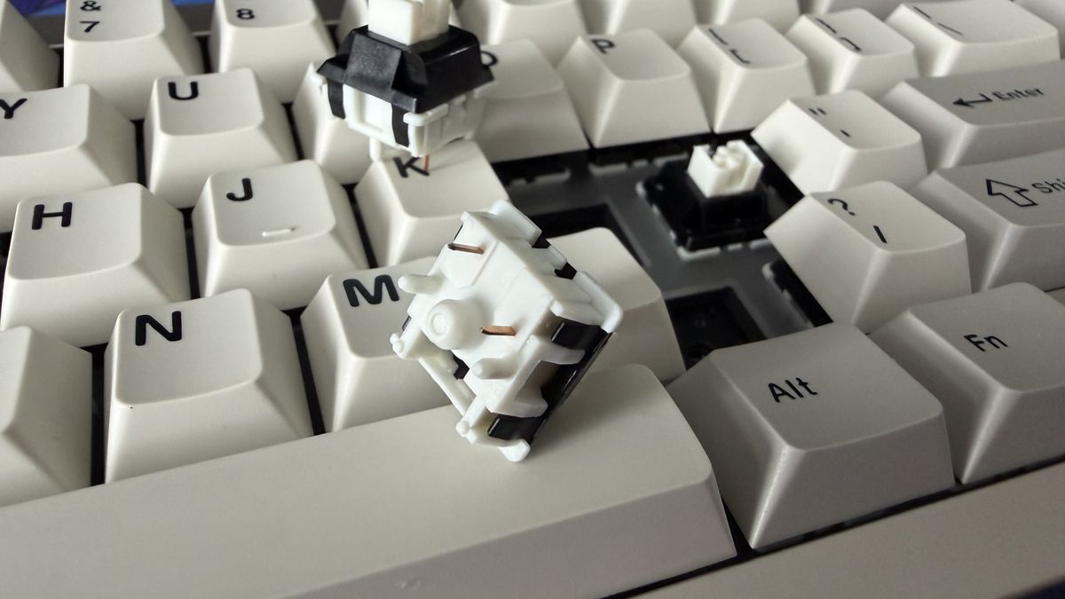 Switches being removed from the Epomaker 65.