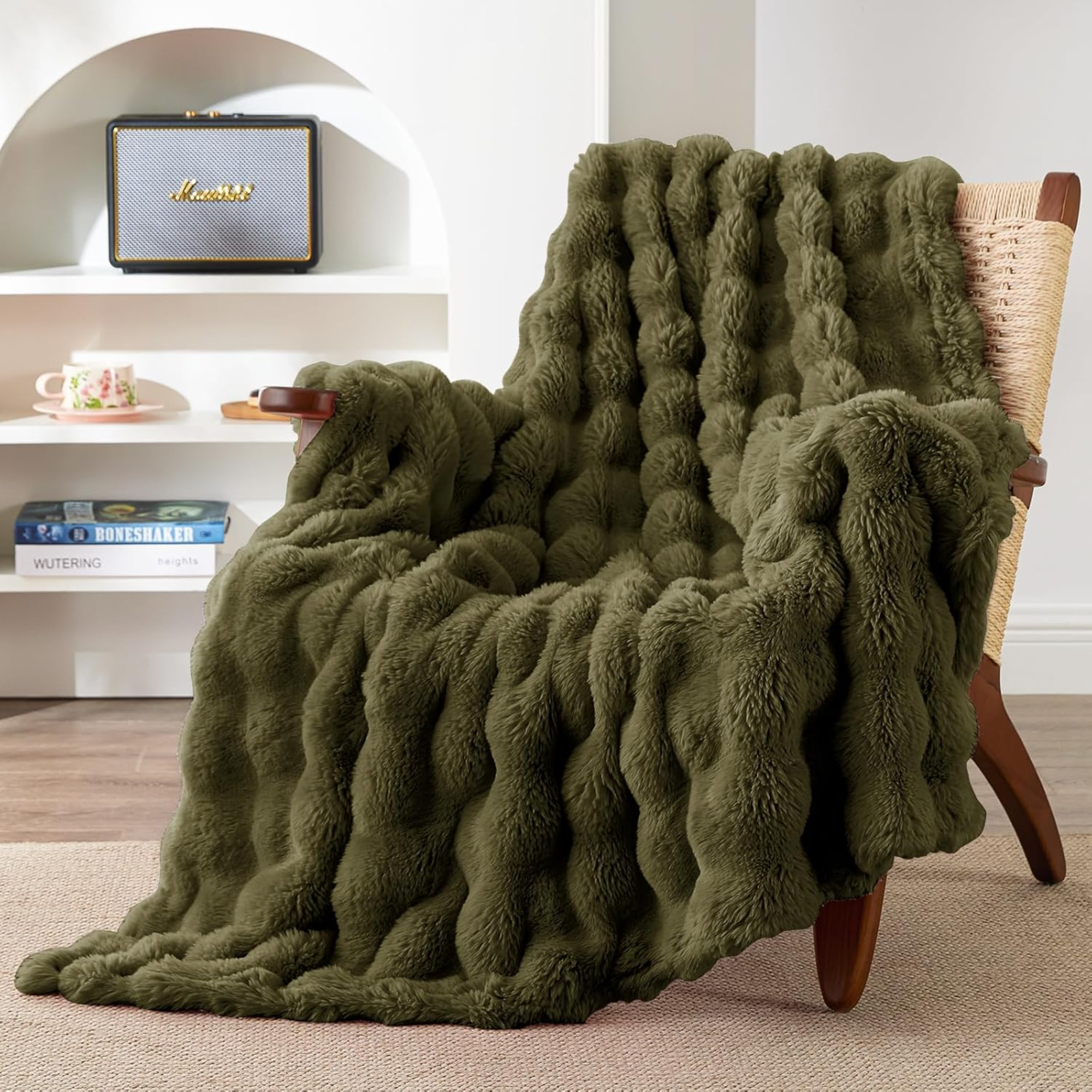 a green fuzzy throw blanket