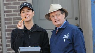 Cote de Pablo and David McCallum looking amusingly at something offscreen