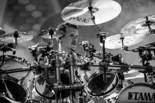 A pocture of Charlie Benante playing the drums