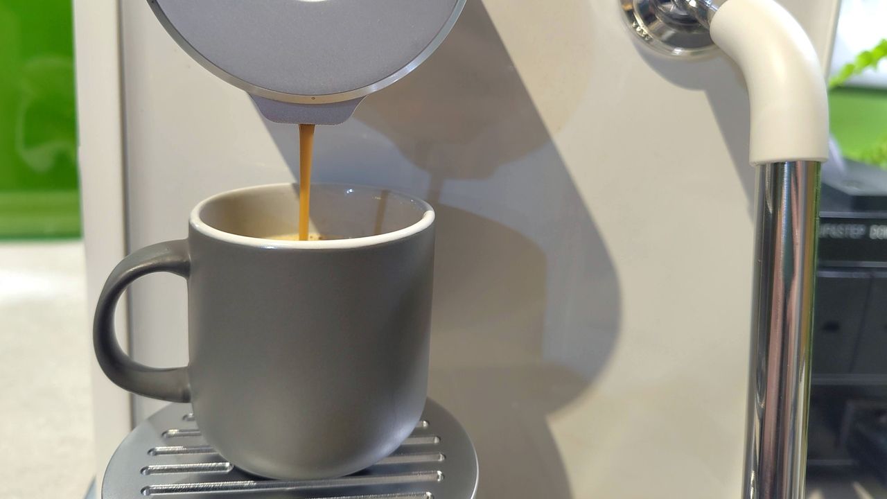 Keurig Alta coffee maker dispensing espresso