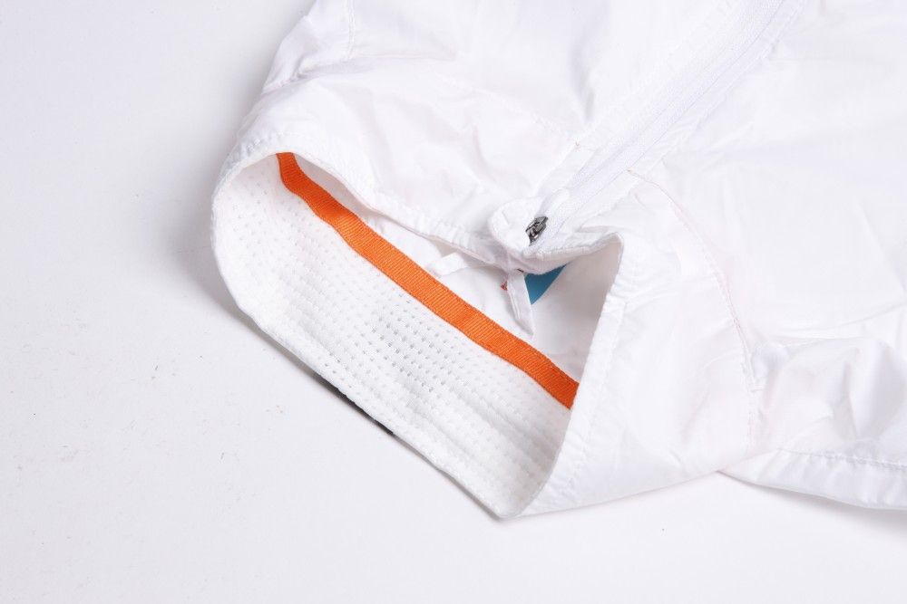 Close up of the neck of a white gilet