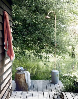 garden decking idea with outdoor shower area