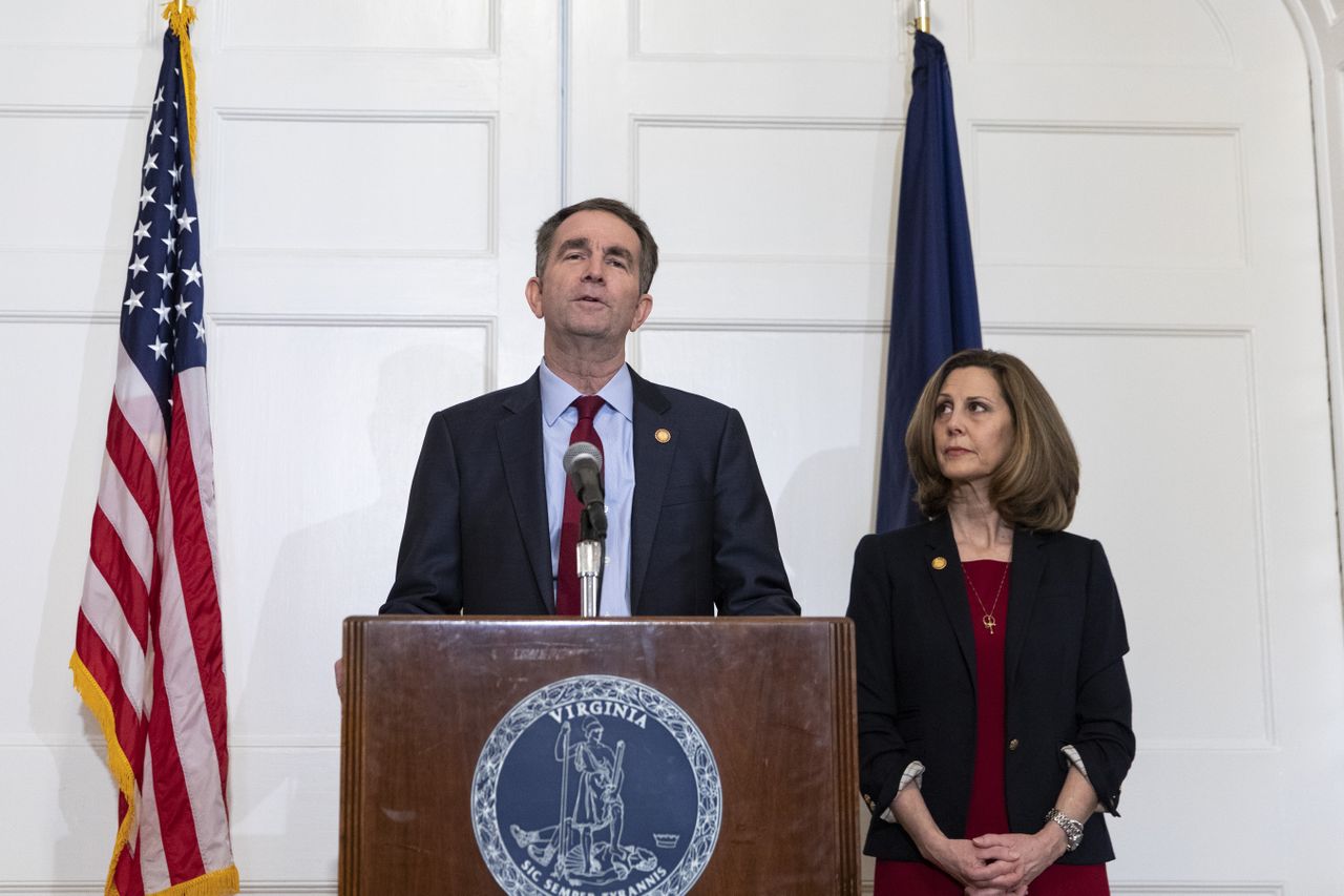 Virginia Governor Ralph Northam (D), flanked by his wife Pam, speaks with reporters at a press conference at the Governor&amp;#039;s mansion on February 2, 2019 in Richmond, Virginia. 