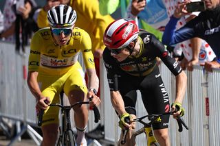 UAE Team Emirates - XRG team's Slovenian rider Tadej Pogacar wearing the overall leader's yellow jersey and Team Visma - Lease a bike team's Danish rider Jonas Vingegaard cycle in the ascent of Mont Ventoux during the 16th stage of the 112th edition of the Tour de France cycling race, 171.5 km between Montpellier and Mont Ventoux, southern France, on July 22, 2025. (Photo by Anne-Christine POUJOULAT / AFP)