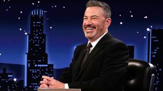 Jimmy Kimmel is shown hosting his talk show Jimmy Kimmel Live!