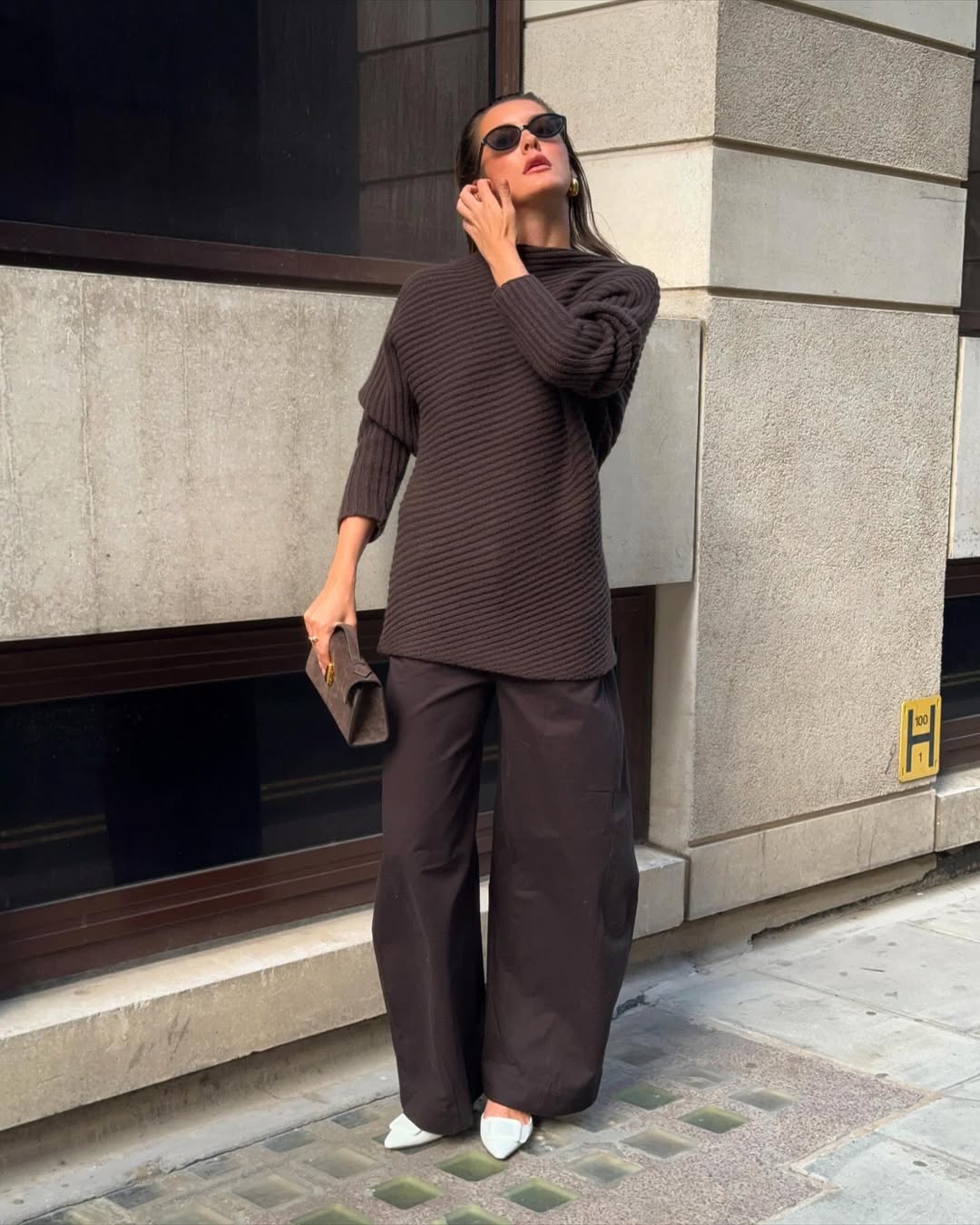 Valeria in an all brown outfit