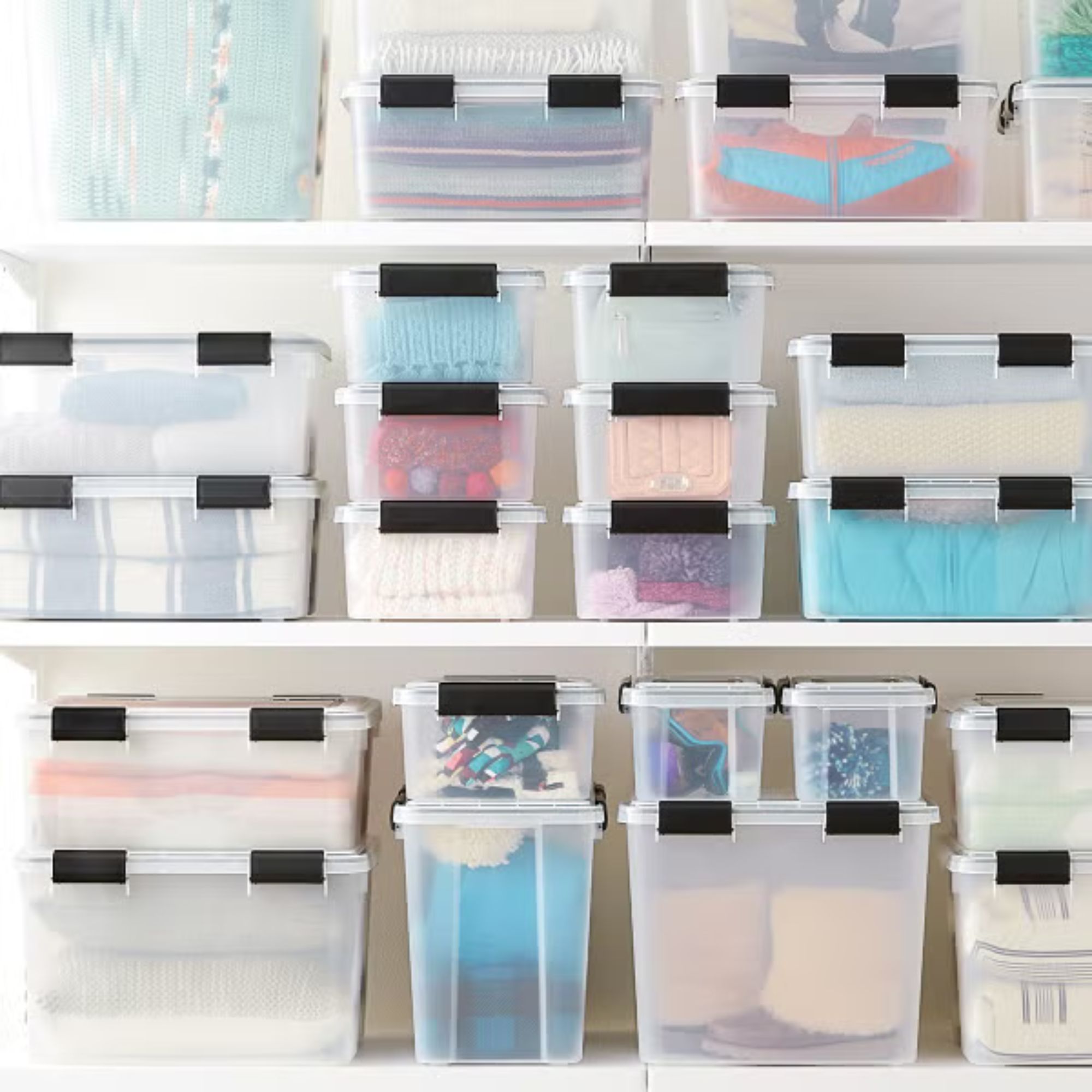Clear Weathertight Totes on shelves.