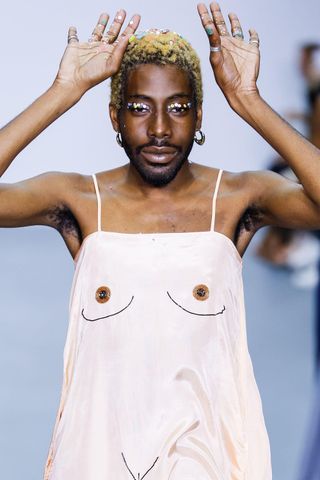 Male model with bleached natural hair in the Ashish show, Spring Summer 2016
