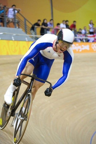 Chris Hoy (Great Britain) muscles his way to a two-race elimination