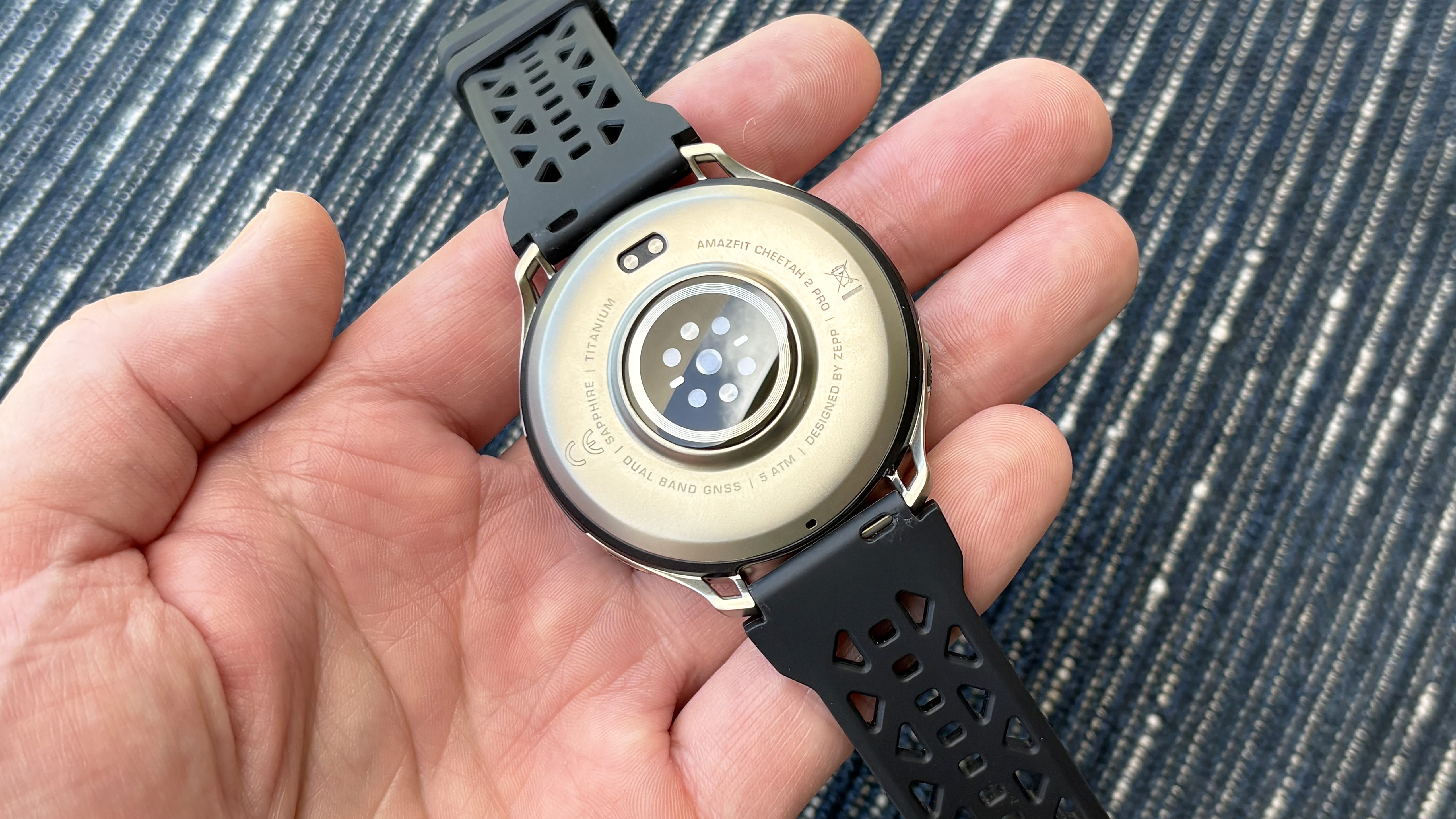 Close-up of the Amazfit Cheetah 2 Pro smartwatch, a budget-friendly competitor to the Garmin Forerunner 970