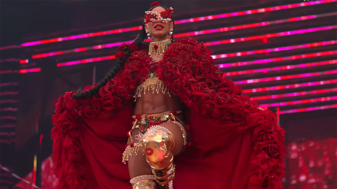 Bianca&#039;s war of the roses red cape and gold gear at Wrestlemania 2025. 