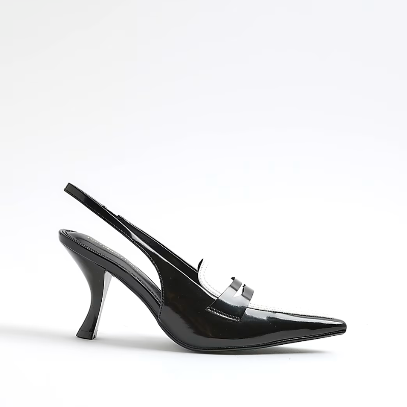 A black and white heeled loafer