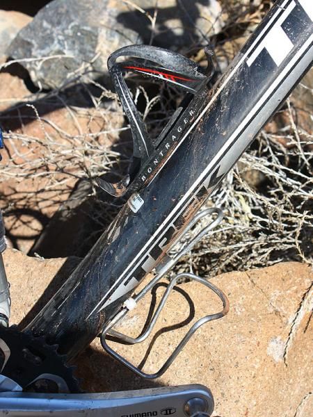 The carbon fiber Bontrager Race X Lite carbon bottle cage is matched to a stainless steel King cage down below - but Moab's notorious rocky course claimed a weld on the inverted King cage so a zip-tie was put to use mid-race.