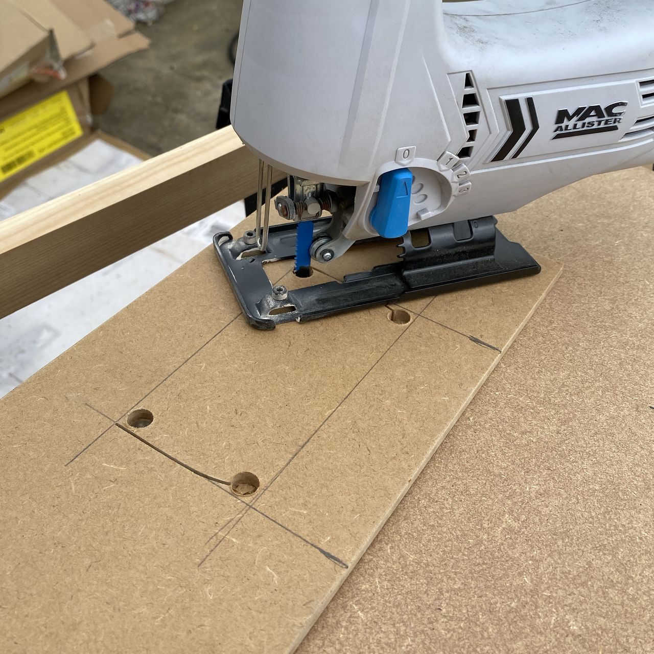 Cutting a plug hole in wall panelling