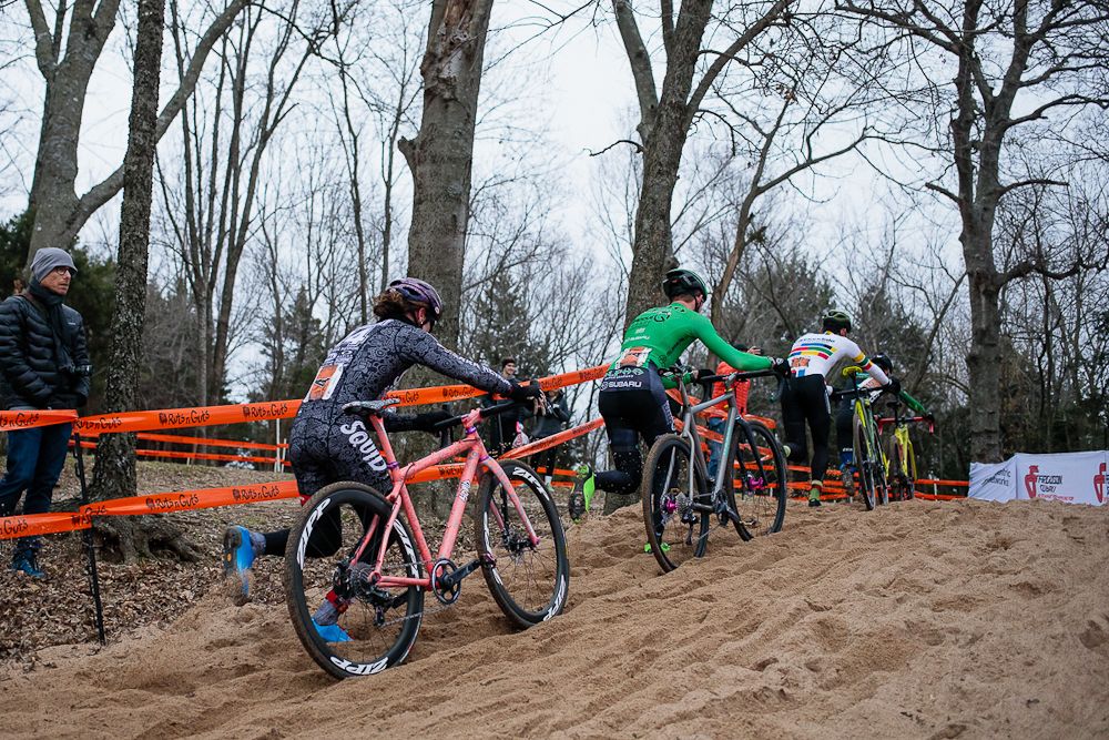 The leaders run through the sand at Ruts 'n' Guts